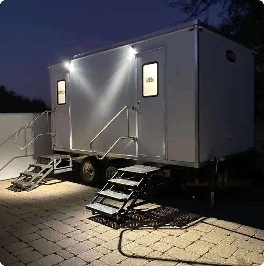 A trailer featuring a bathroom on the side,